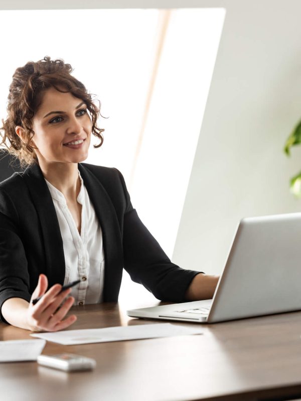 smiling consultant talking to a client on a business meeting portrait .jpg