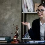 Young female Lawyer or attorney working in the office