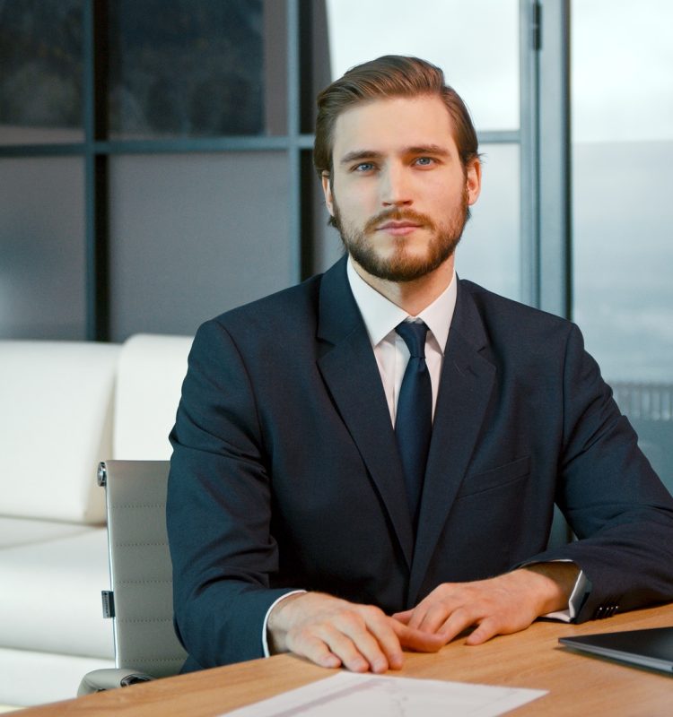 Young man looking at camera consult client